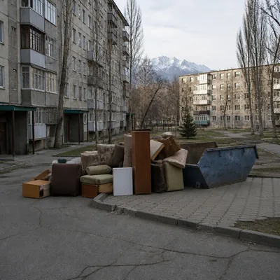 Pile of old furniture in the yard on Saina before removal