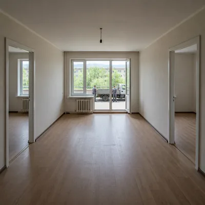 Empty wall after old windows removed, swept floor